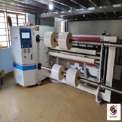 Label Stock Doctoring Cum Slitting Machine