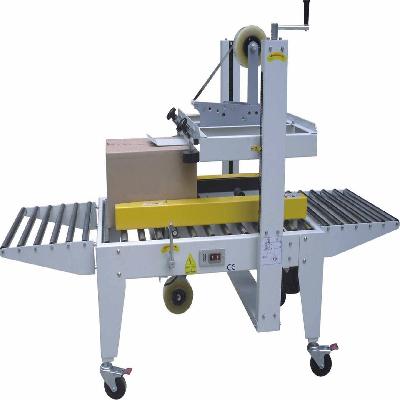 Box Strapping Machine
