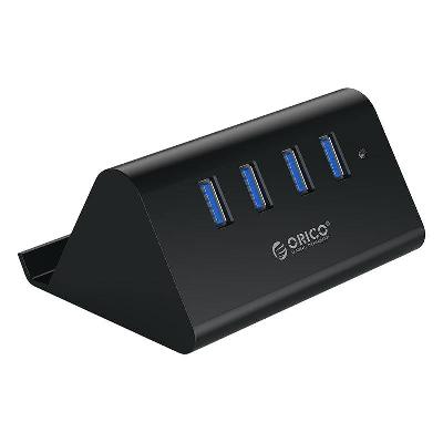 A Usb Hub With Stationery And Mobile Holder