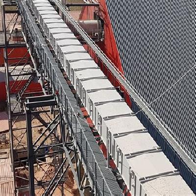 Belt conveyor over bridge