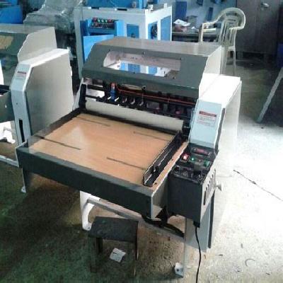 Sticker Punching Machine