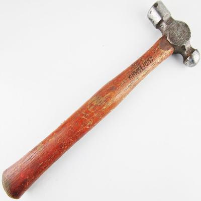 Ball Peen Hammer Along Wooden Handle