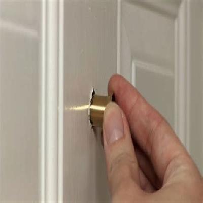 Small Cast Peep Door