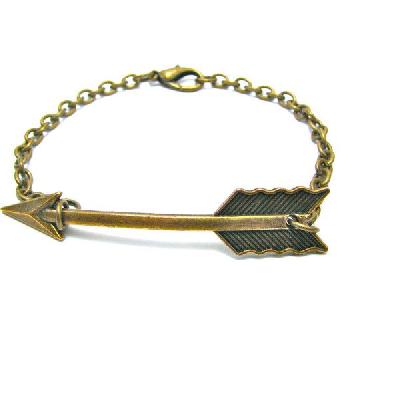 Golden arrow fletching design medal