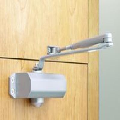 Holder and Release Device With Integral Door Closer