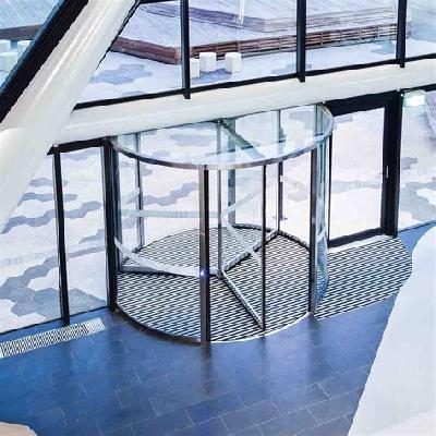 Revolving Doors Of All-Glass Design