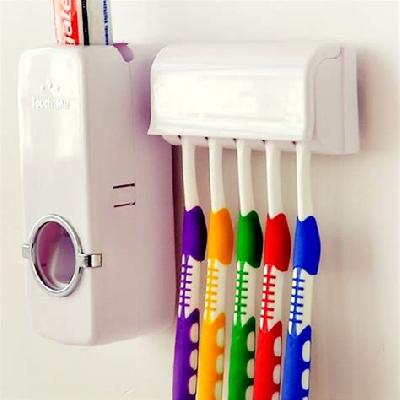 Toothpaste Dispenser and Brush Holder